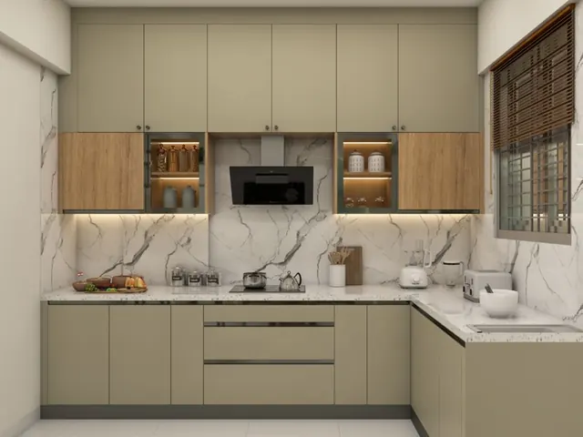L-shaped modular kitchen in matte sage cabinetry with marble backsplash